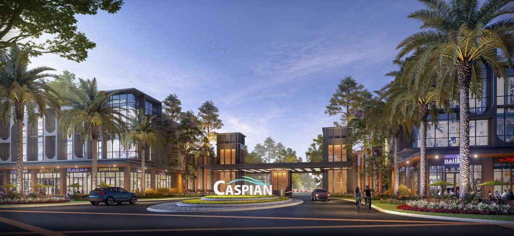 Sunny outdoor shopping center with palm trees, glass-front stores, and a circular fountain sign reading CASPIAN.