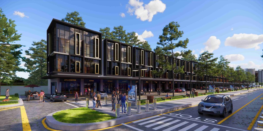Modern multi-story storefronts along a tree-lined street with pedestrians and parked cars.